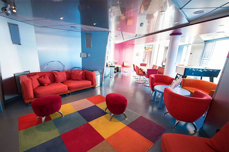 Club HAL hangout space with sofas and chairs on the Eurodam