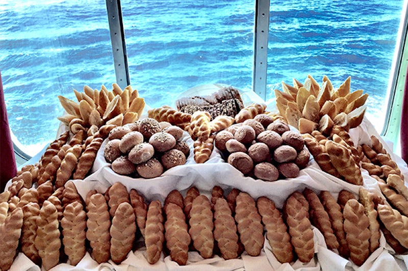 Loaves of bread onboard a Kosherica cruise, with ocean in the background