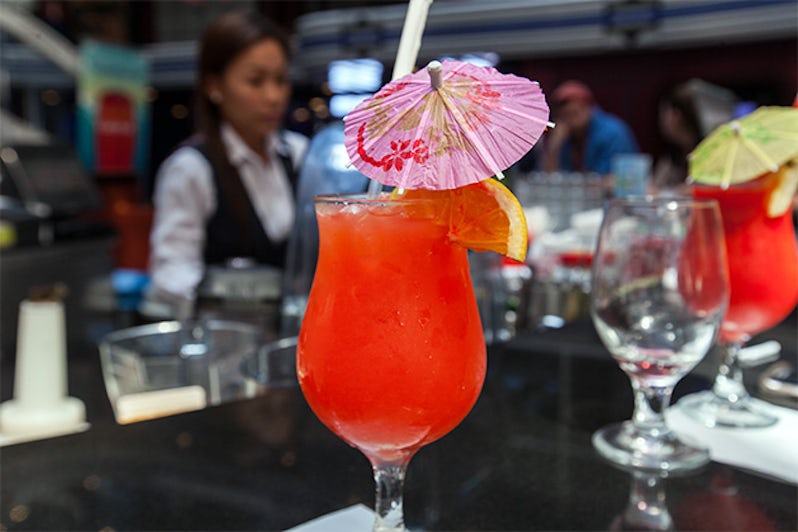 Close-up shot of a fruity red drink at Carnival Fantasy's Atrium Bar