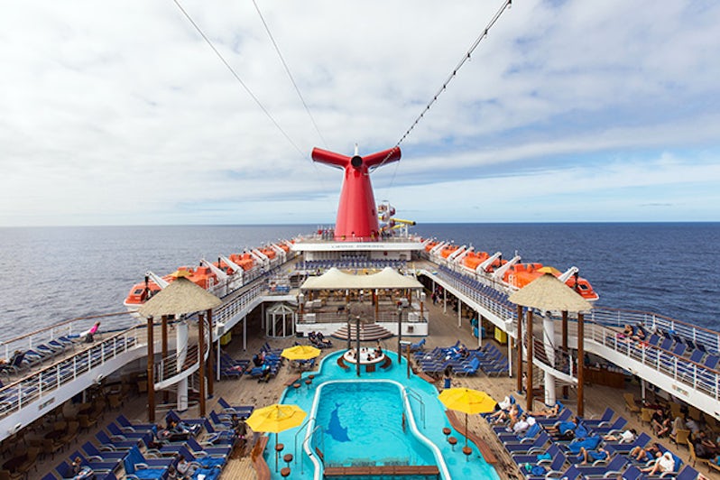 Aerial view of Carnival Inspiration's pool deck with the ship at sea