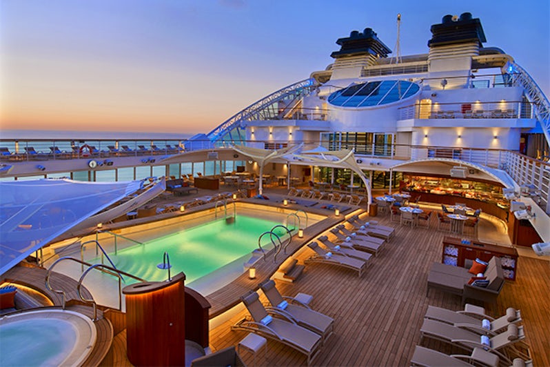 The Seabourn Encore pool deck at sunset