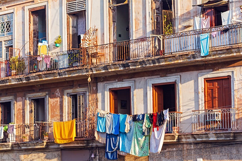 Fresh laundry on the balcony of old home, Havana, Cuba