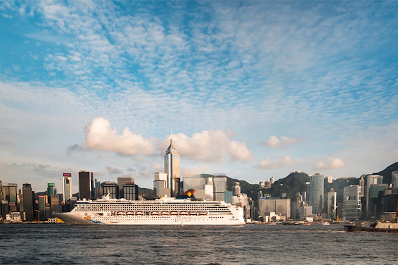 Two Cruises passing through the busy Victoria Harbor