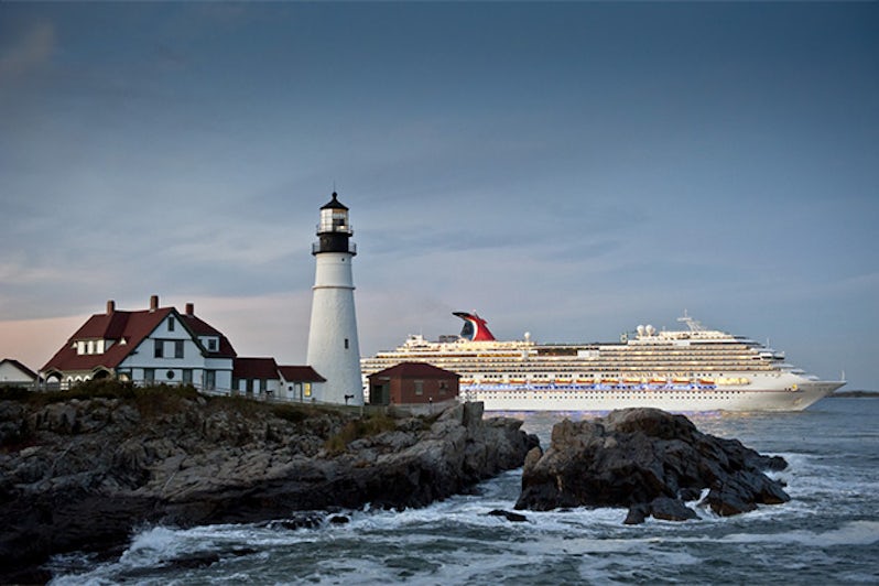 Carnival Splendor cruise ship sails past Portland Head Lighthouse