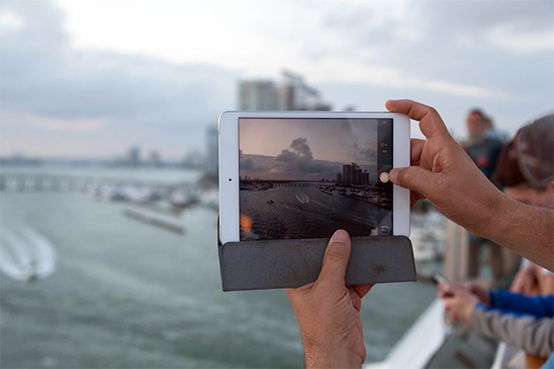 Close-up shot of an iPad on MSC Divina, as the ship is leaving Miami