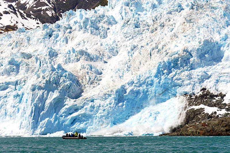 Passengers exploring the Aialik Glacier by Zodiac