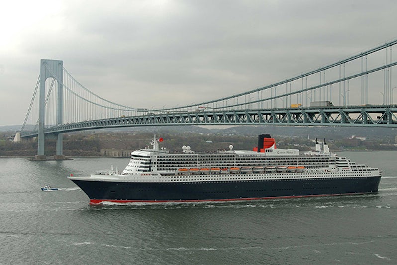 Cunard ship sailing under the Verrazano Bridge