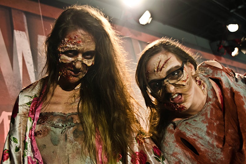 Two girls dressed as zombies