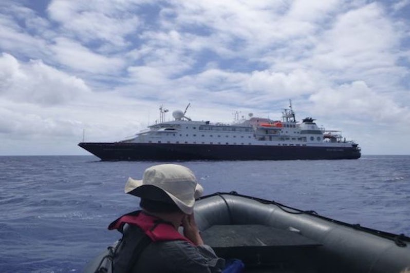Cruise Critic member itravellux returning to Silver Discoverer after a Silversea-hosted shore tour in the South Pacific (Photo: itravellux/Cruise Critic Member)