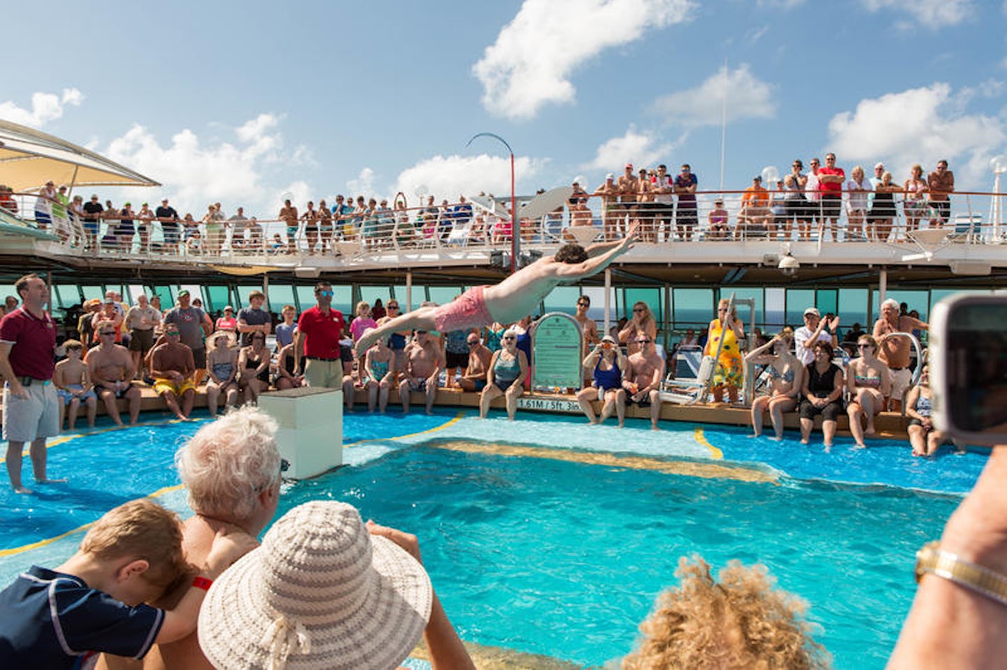 Men's Belly Flop Contest at the Main Pool on Vision of the Seas