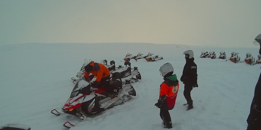 Snowmobiling on an Arctic shore excursion in Norway (Photo: Adam Coulter)