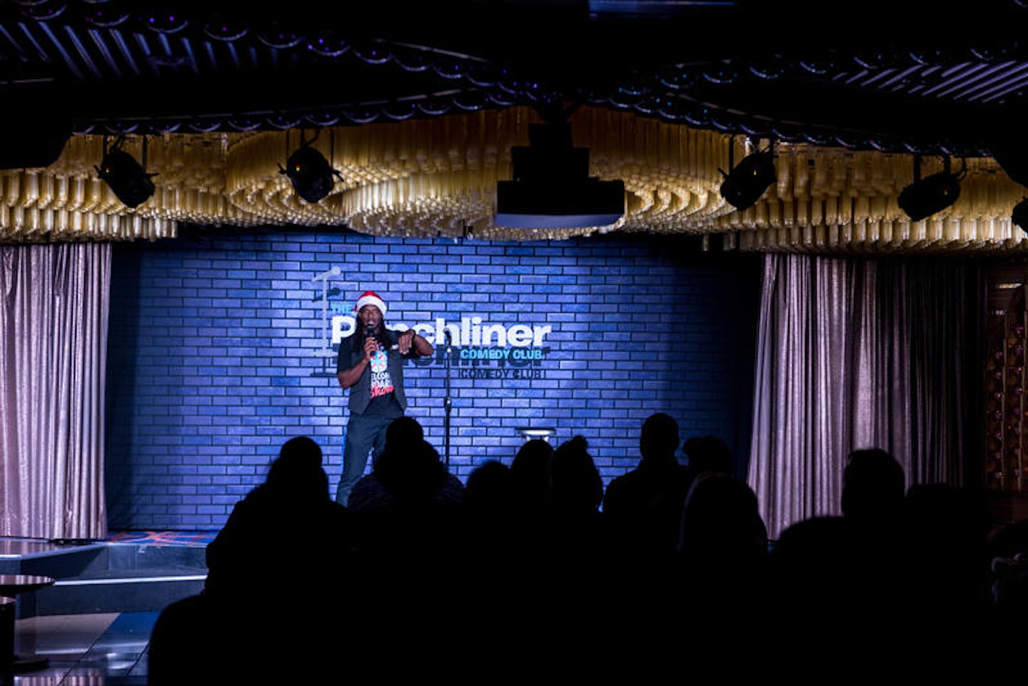 Punchliner Comedy Club in the Cole Porter Aft Lounge on Carnival Elation