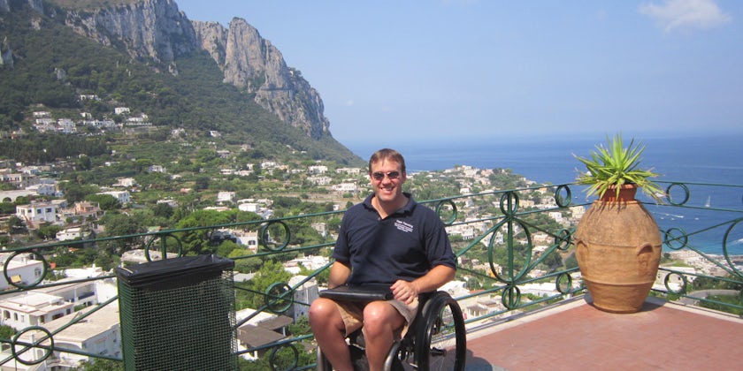 John Sage, owner and founder of Accessible Travel Solutions on a shore excursion in Capri, Italy (Photo: Silversea Cruises)