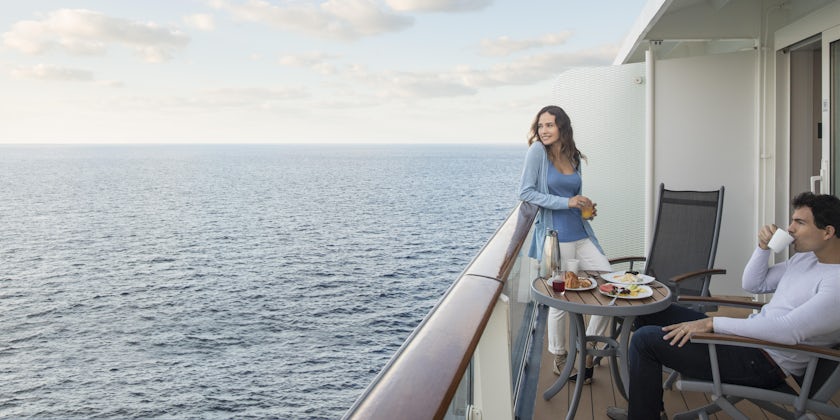 Couple enjoying a meal in their stateroom balcony (Photo: Celebrity Cruises)