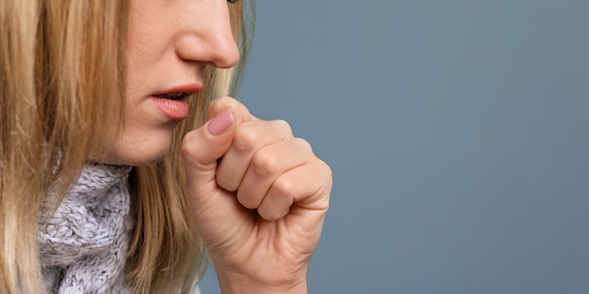 Young Woman Coughing (Photo: New Africa/Shutterstock)