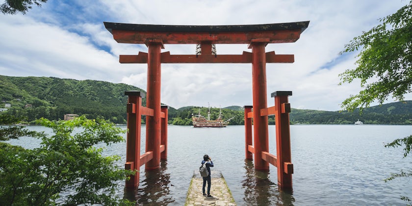 Traveler Photographing Lake Ashi, Japan (Photo: kitzcorner/Shutterstock)