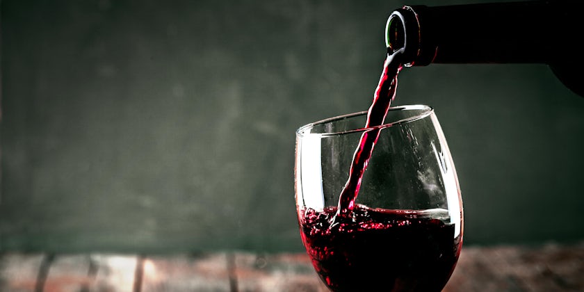Wine Being Poured in Glass (Photo: mythja/Shutterstock)