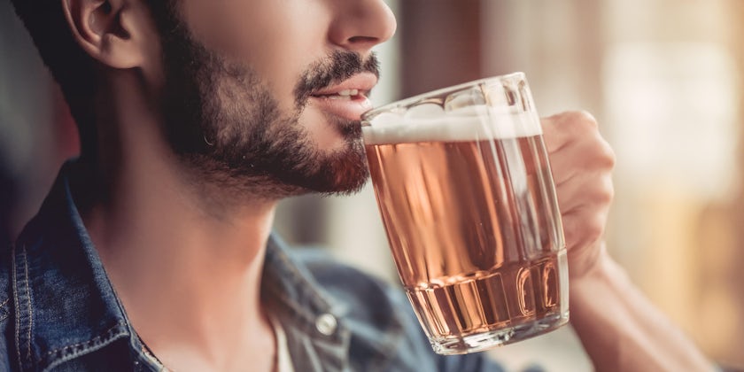 Man Drinking Beer (Photo: 4 PM production/Shutterstock)