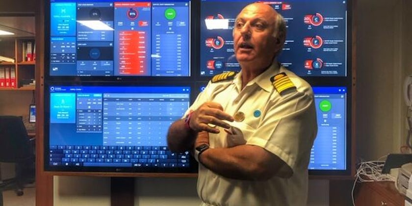 Captain Marco Fortezze shows off the management console for the Muster safety drill (Photo by Carolyn Spencer Brown)