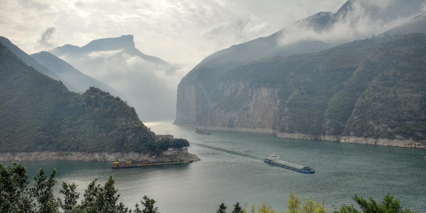 Ships in the slightly foggy Qutang Gorge on Yangtze river