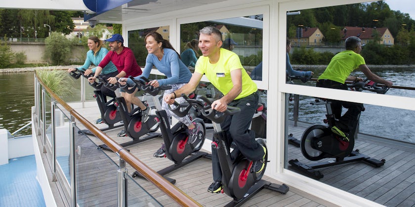 AmaMagna passengers doing a spin class on the aft of the ship