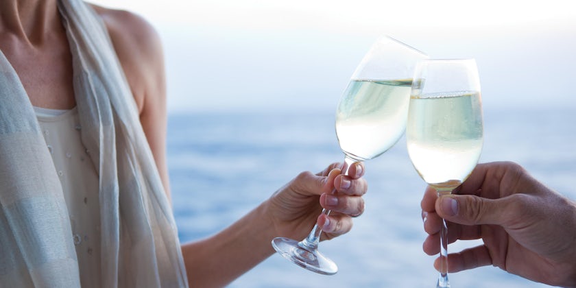 Couple drinking Champagne on a cruise (Photo: Regent Seven Seas Cruises)