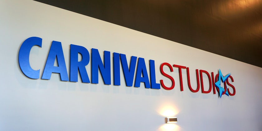 The blue and red sign for Carnival Studios