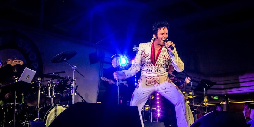 An Elvis impersonator performing onboard The Malt Shop Memories Cruise