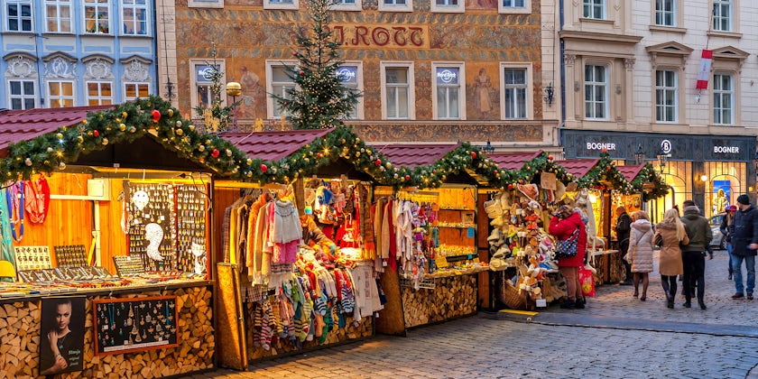 Wooden booths offering souvenirs during Christmas Market in Prague, Czech Republic (Photo: Rostislav Glinsky/Shutterstock)