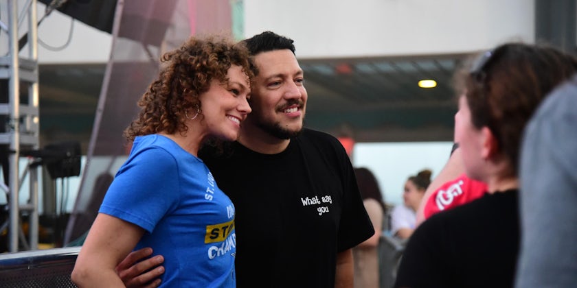 Sal Vulcano posing for a photo with a fan