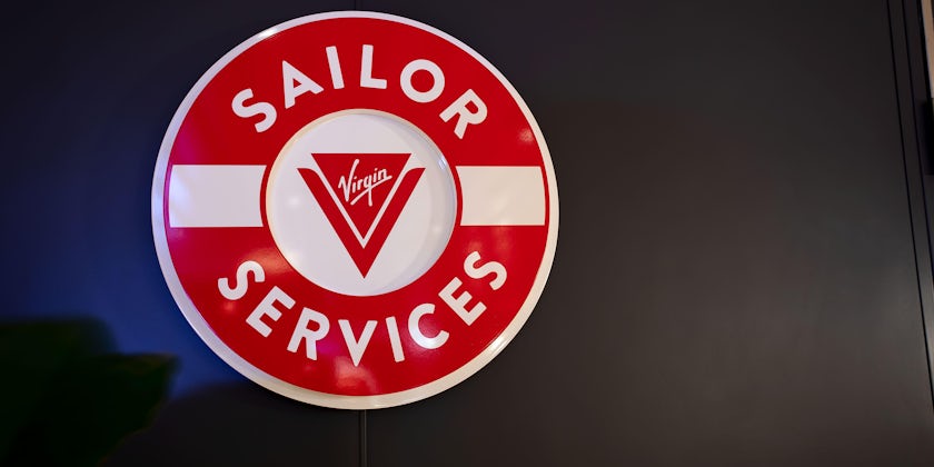 Photo of the Sailor Services desk area on Scarlet Lady