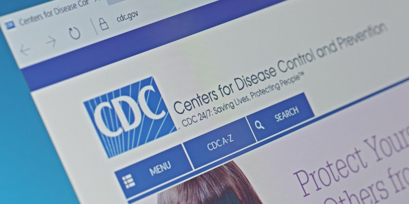 A computer screen shows details of Centers for Disease Control and Prevention main page on its web site. Selective focus.