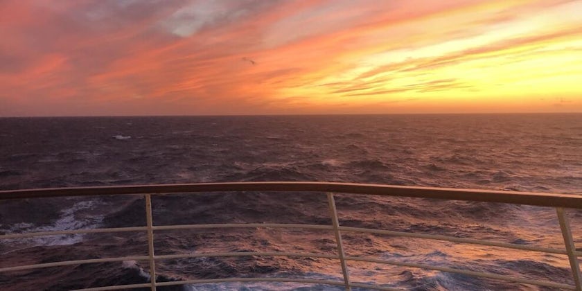 Sunset from the Penthouse Suite balcony on Seven Seas Voyager (Photo: johnsva0511/Cruise Critic member)