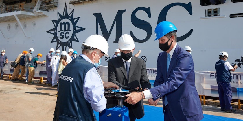 MSC Cruises and Fincantieri representatives open the valves at MSC Seashore's float out ceremony (Photo: MSC Cruises)