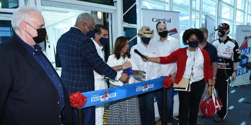 Cutting the gangway ribbon prior to boarding Carnival Horizon in PortMiami on July 4, 2021