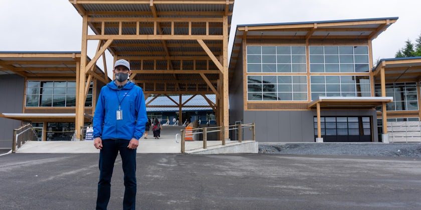 Chris McGraw, manager of Halibut Point Marine, stands in front of Sitka's new cruise terminal at Halibut Point (Photo: Aaron Saunders/Cruise Critic)