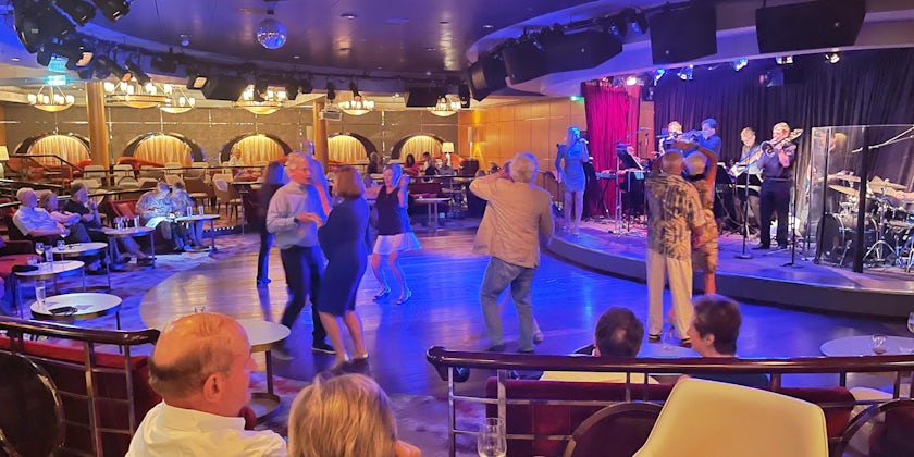 Echoes of Before Times: Passengers practice their dance moves in the Galaxy Lounge (Photo: Laura Bly)