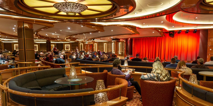 Passengers wait for a show in the Vista Lounge aboard Majestic Princess (Photo: Aaron Saunders)