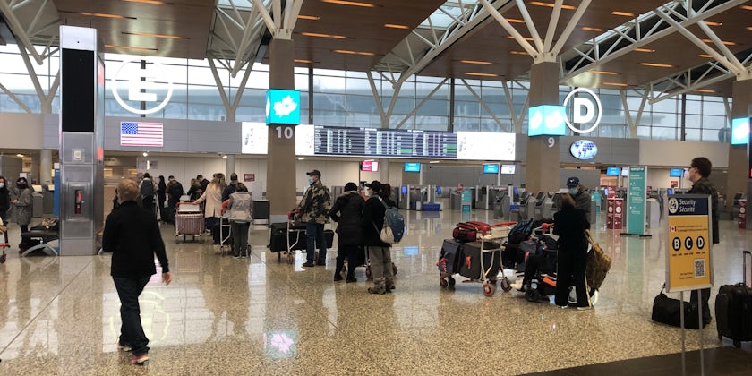 Long lines can be a reality for Canadians looking to fly to the United States (Photo: Aaron Saunders)
