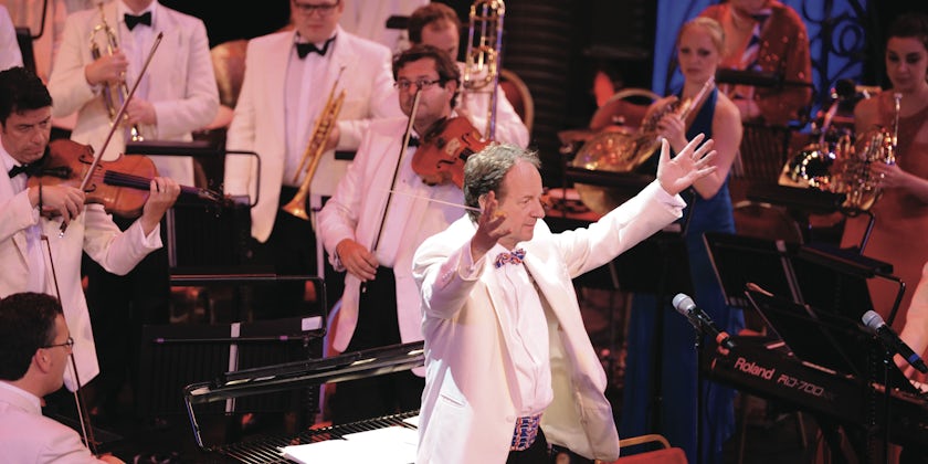Anthony Inglis conducts the National Symphony Orchestra aboard Queen Mary 2 (Photo: Cunard)