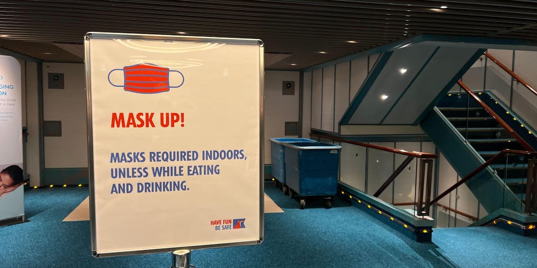 Mask up on  Carnival  Radiance ( Photo by  K.  Alex  Beaven)