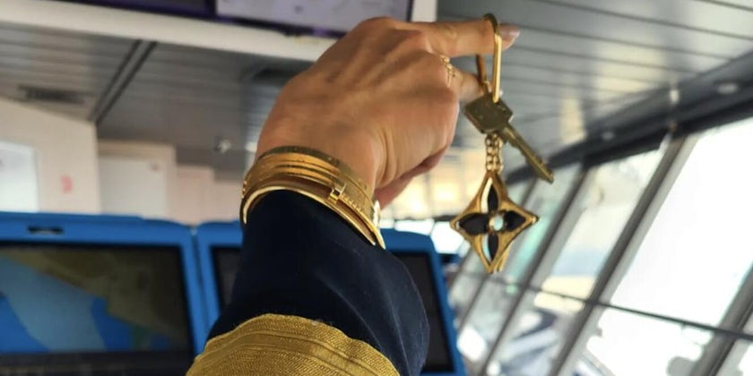 Celebrity Cruises' Captain Kate holds the keys to her new ship, Celebrity Beyond. (Photo: Kate McCue, Instagram)