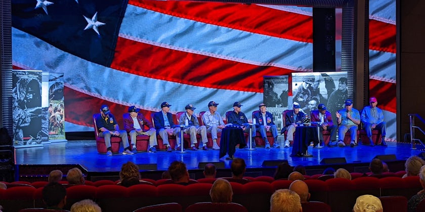 A group of The Greatest Generations Foundation veterans speak from aboard Queen Mary 2. (Photo: John Roberts)