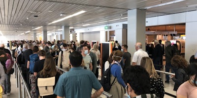 Crowds at Amsterdam Airport Schiphol in May 2022 (Photo: Aaron Saunders)