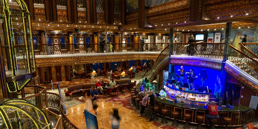 Carnival Spirit's soaring Atrium hosts live music and games throuhout the day (Photo: Aaron Saunders)