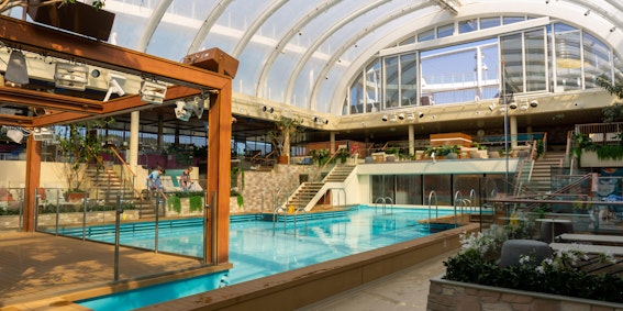 The indoor pool "Beach Club" aboard Costa Toscana is a real hit. (Photo: Aaron Saunders)