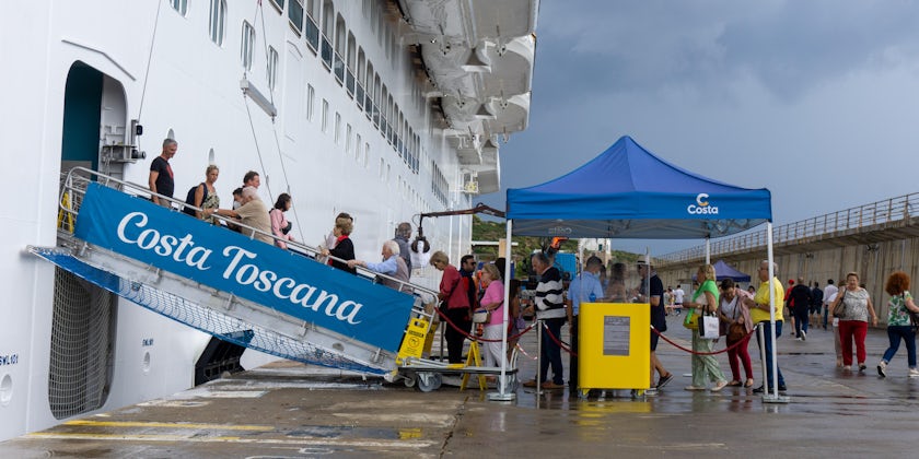 Passengers disembark Costa Toscana in Ibiza, Spain (Photo: Aaron Saunders)