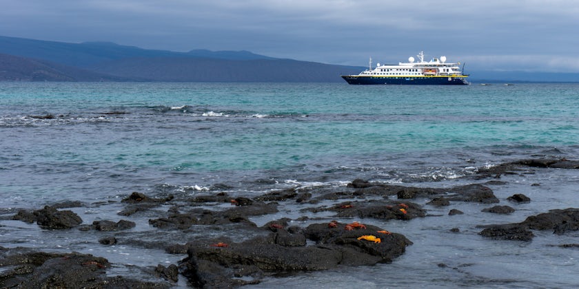 National Geographic Islander II at anchor off Fernandina Island, Galapagos (Photo: Aaron Saunders)