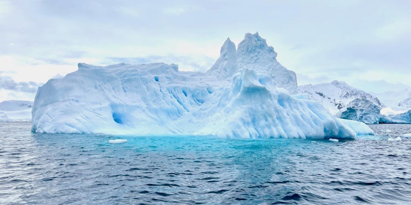 Turquoise iceberg in Antarctica on Atlas Ocean Voyages' World Traveller cruise (Photo/Gwen Pratesi)