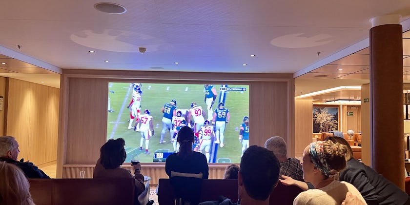 Viking Polaris passengers watching the NFL playoffs (Photo by Chris Gray Faust)